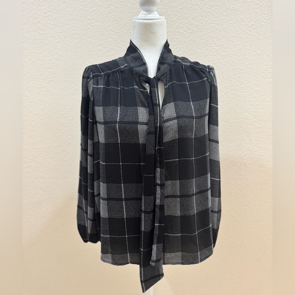 Women’s black and white blouse and Taylor size large petite